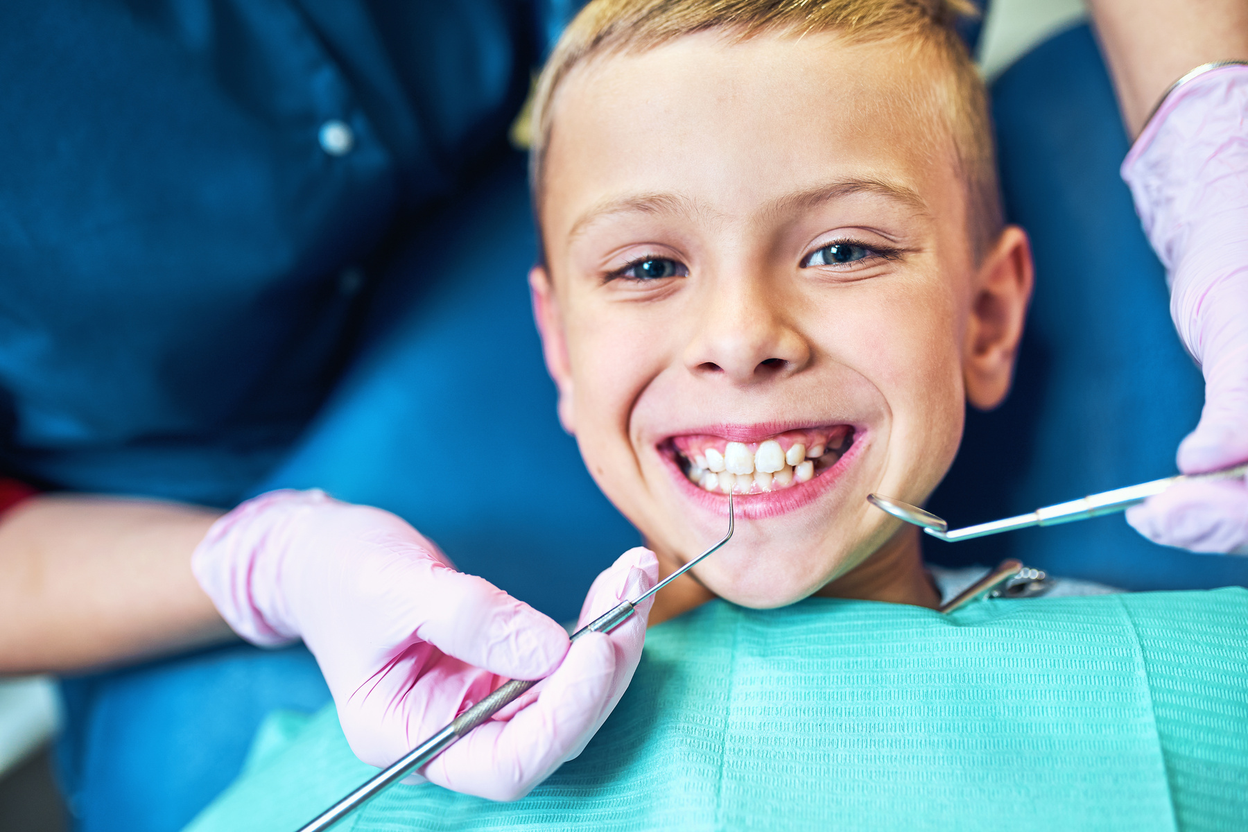 Dentist with Patient at the Clinic